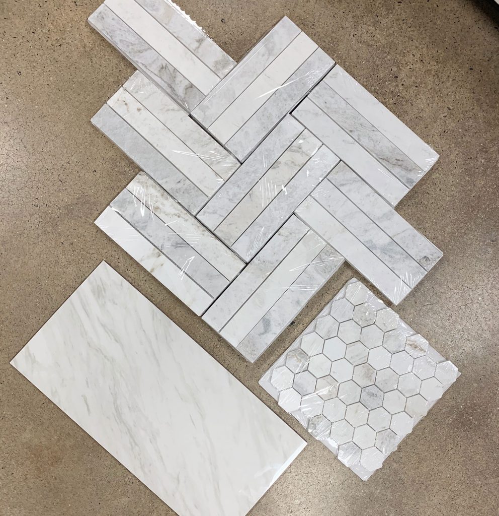 Marble Tile Options Laid Out For Bathroom Renovation