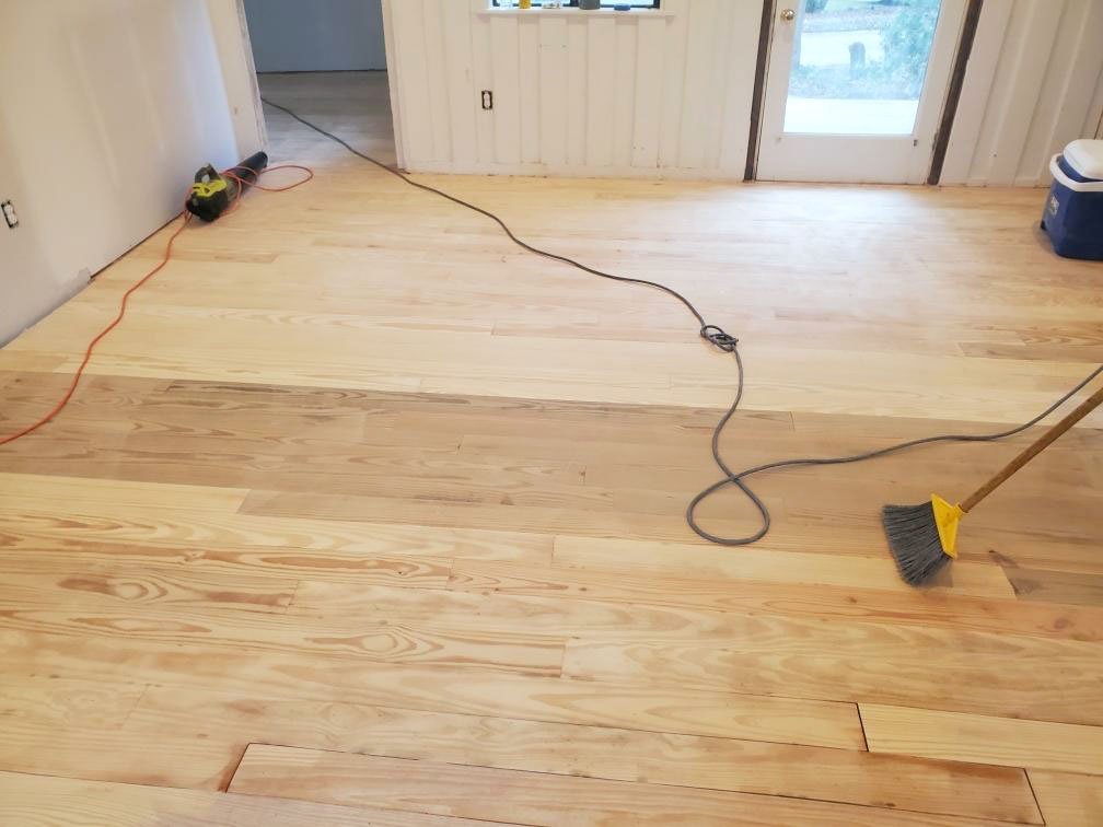 Bare sanded oak floors in beach house