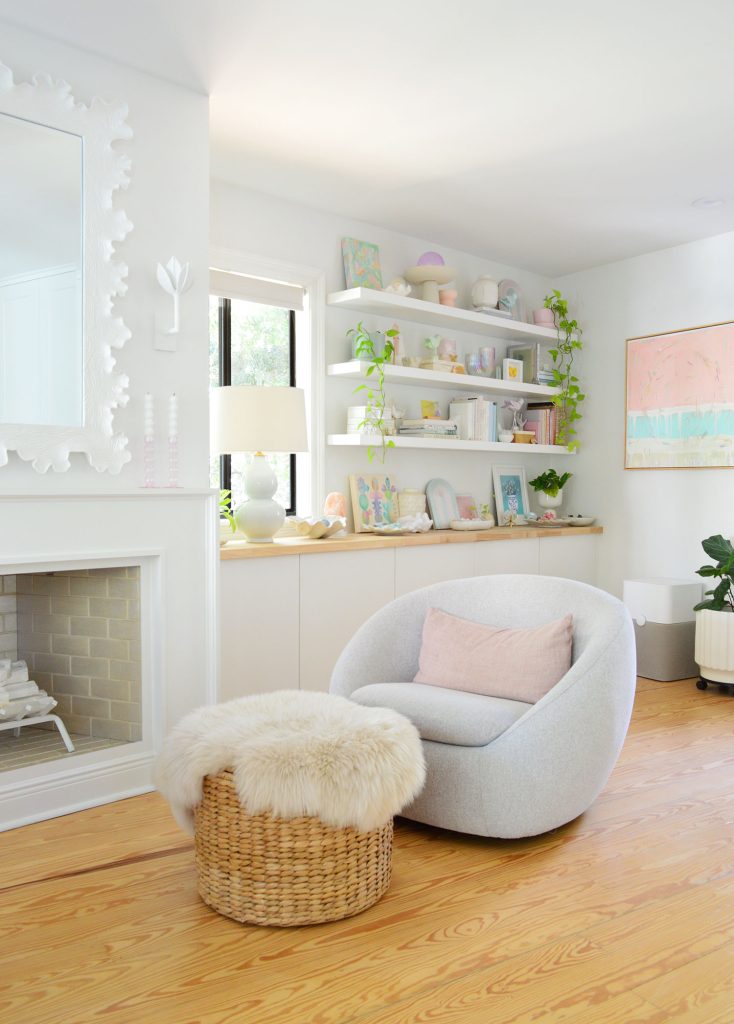 West Elm Swivel Chair In Beachy Bedroom With Ikea Lack Shelves In Background