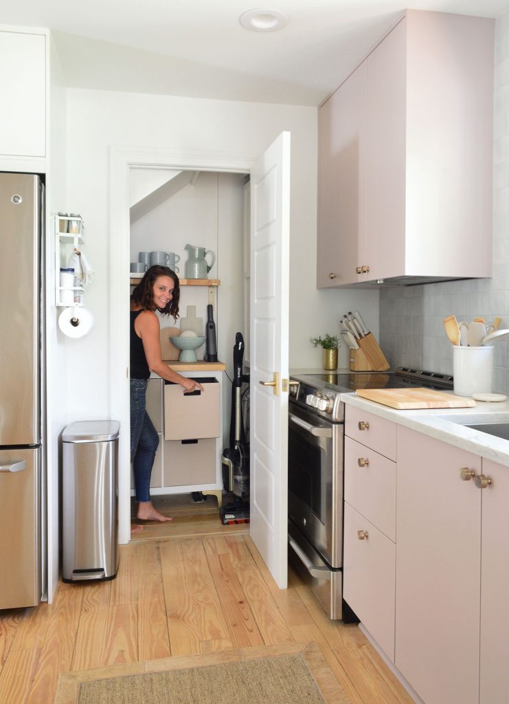 Sherry Standing In Small Utility Closet With Cube Organizer