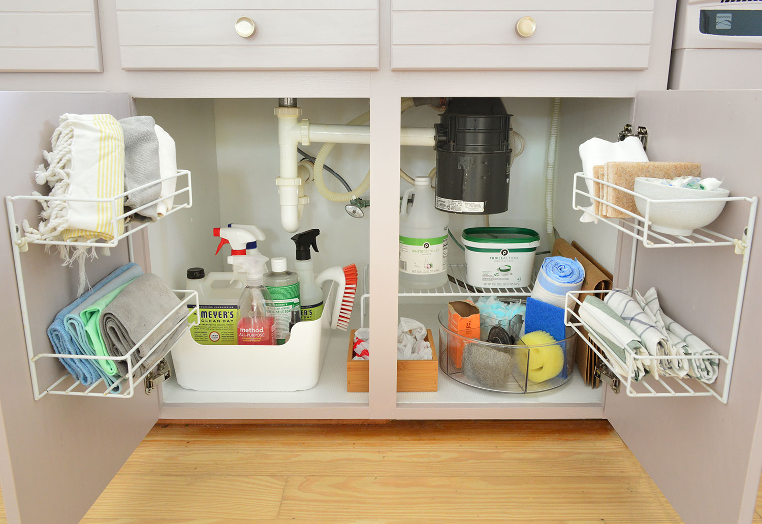 Before Photo Of Storage Under Sink In Old Cabinets With Wire Organizers