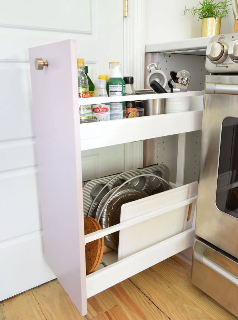 Narrow Drawer Next To Stove With Oils And Cutting Boards