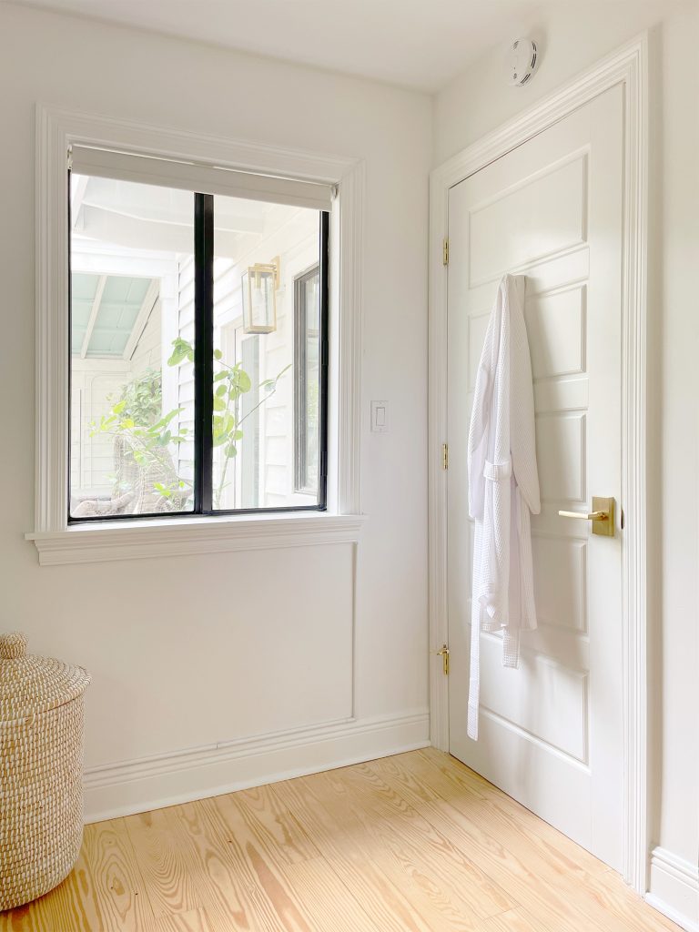 Bedroom Window With Cord Running Along Baseboard Using Cord Control Covers For Smart Roller Shade Blind