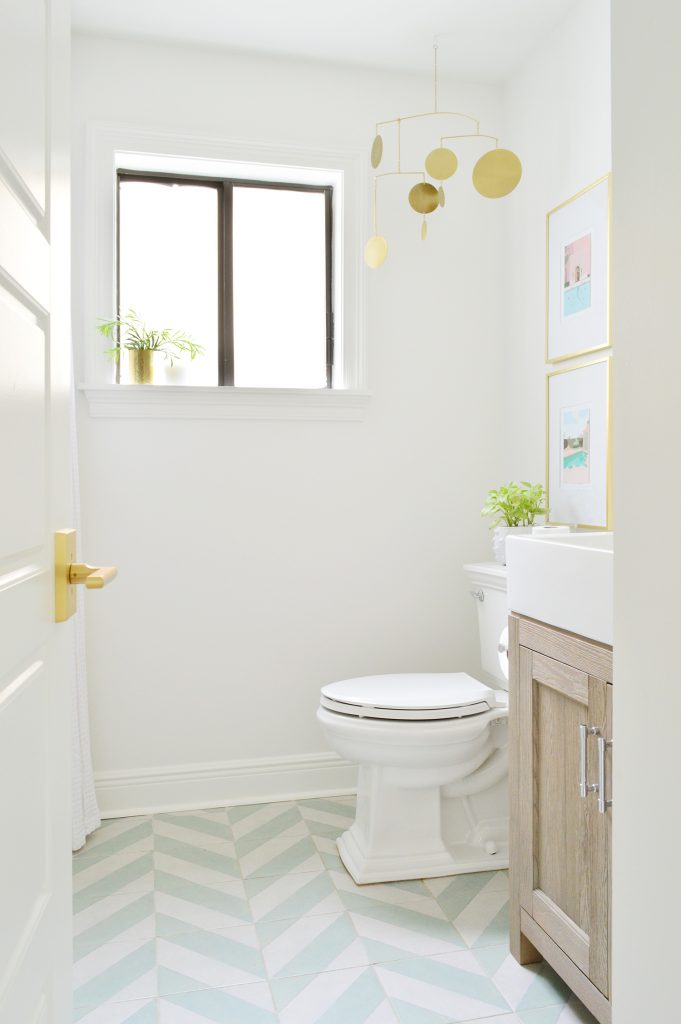 Florida Bathroom With Frosted Window and Colorful Chevron Tile